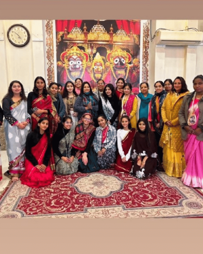 ISKCON Girls Forum members gathered in devotion before Lord Jagannath, Baladeva, and Subhadra